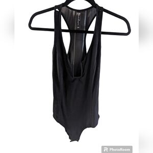 Platinum lingerie body suit metal straps black size L. Sheer in back